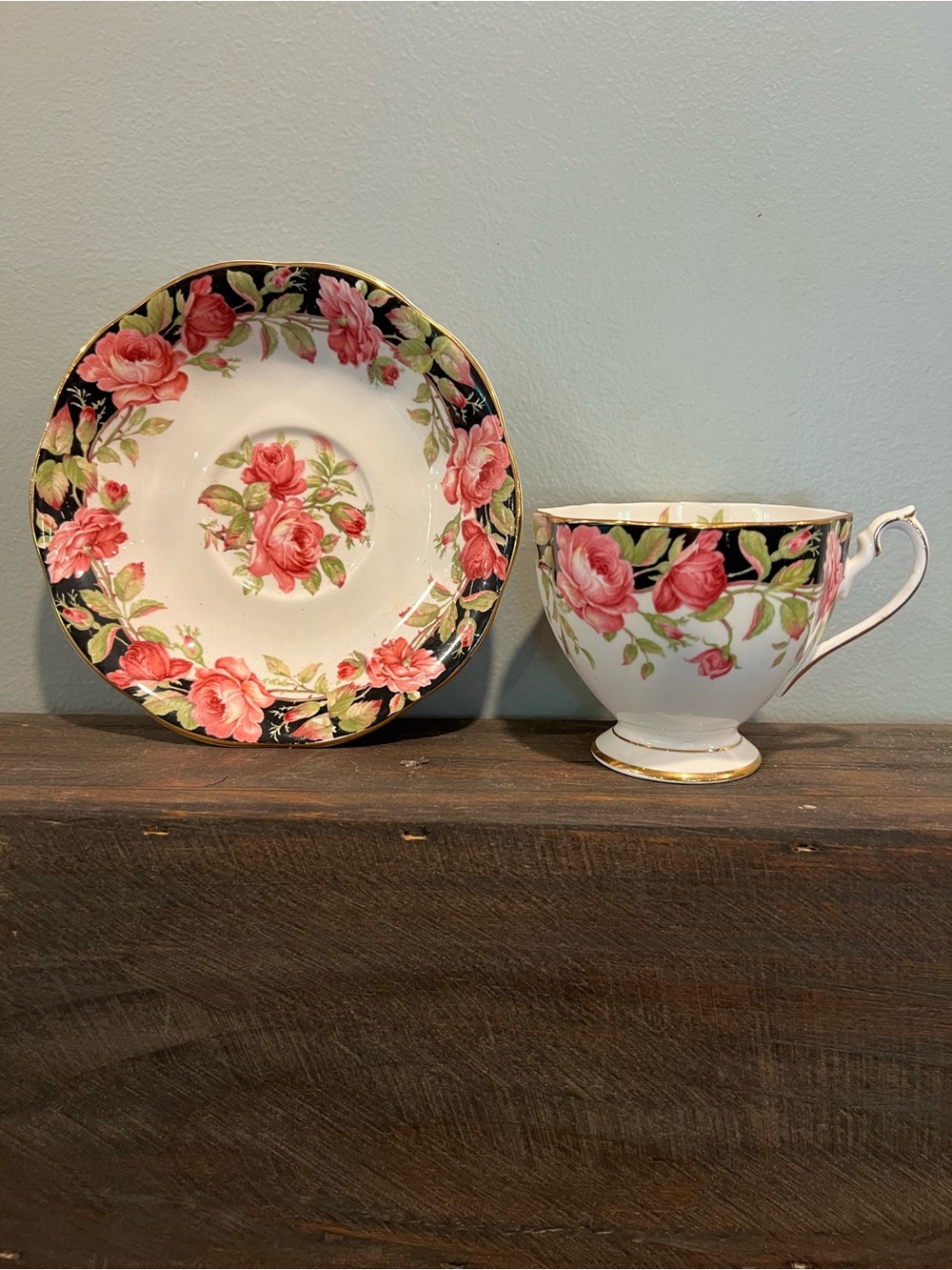 Queen Anne Black Magic Teacup & Saucer. 3-1/2"W x 2-3/4"H. Saucer 5-3/4"W.